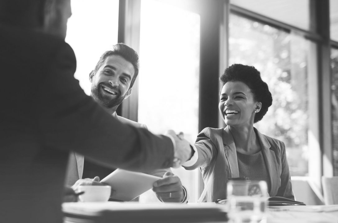 Nonprofit leader shaking donors hand